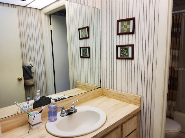 bathroom with vanity and toilet