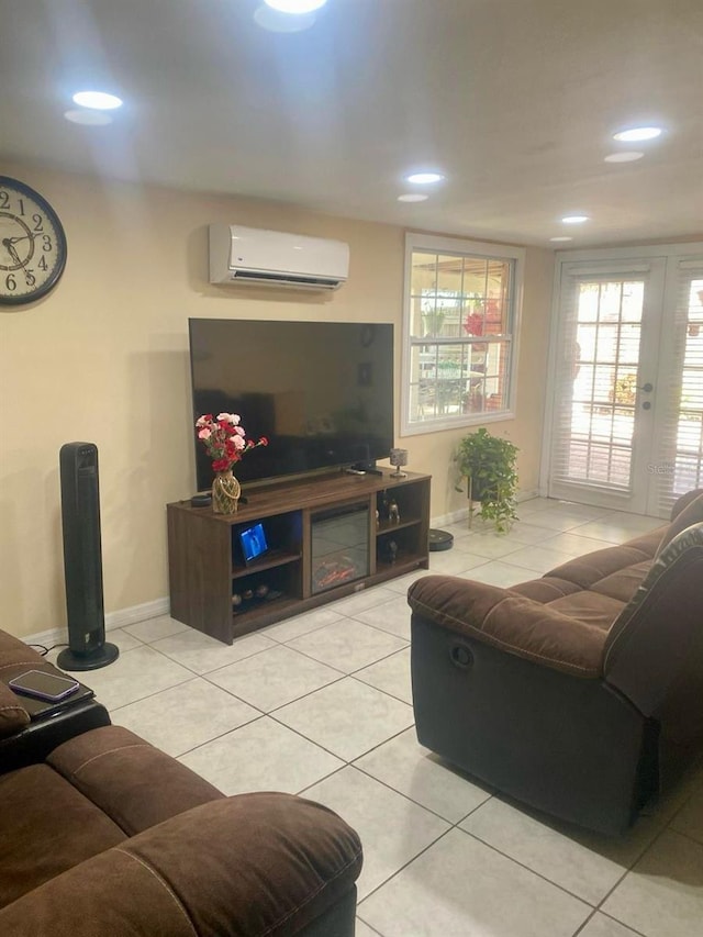 tiled living room featuring a wall unit AC