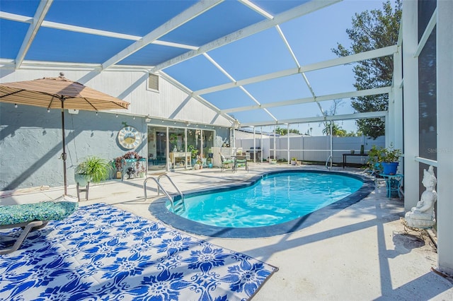 view of pool featuring a patio and a lanai