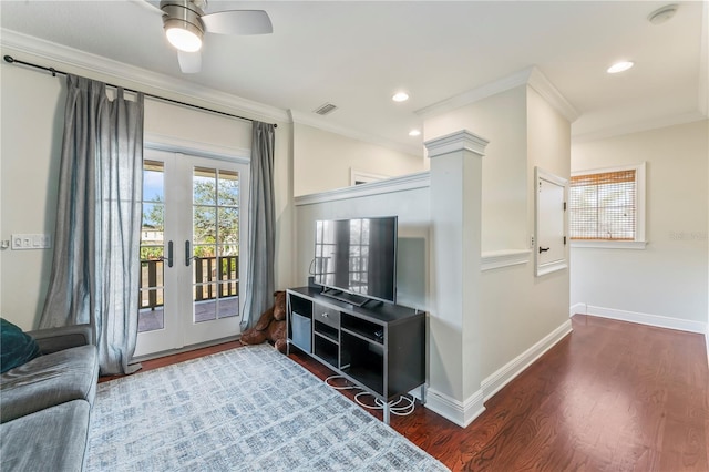 living room featuring ornamental molding, ceiling fan, dark hardwood / wood-style flooring, and french doors