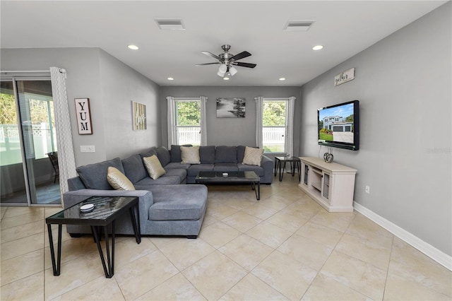 living room featuring recessed lighting, visible vents, ceiling fan, and baseboards