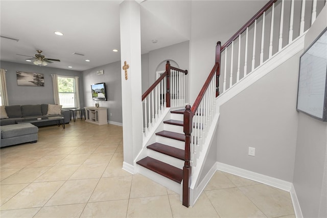 stairs featuring tile patterned flooring, visible vents, baseboards, and recessed lighting