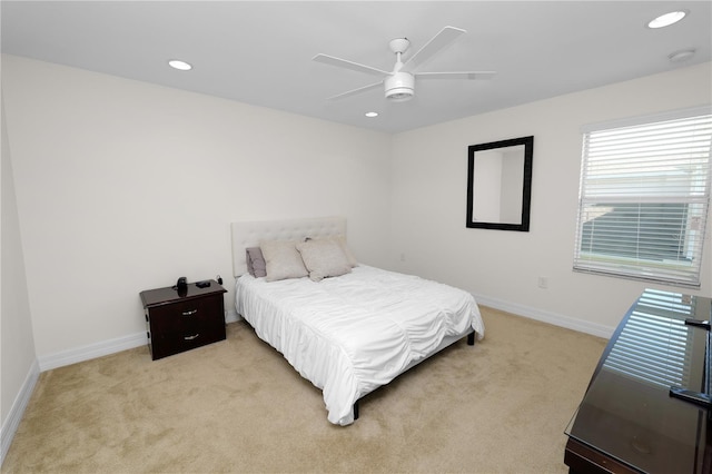 bedroom featuring recessed lighting, baseboards, and light colored carpet