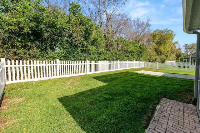 view of yard featuring a fenced backyard