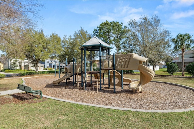 communal playground with a lawn