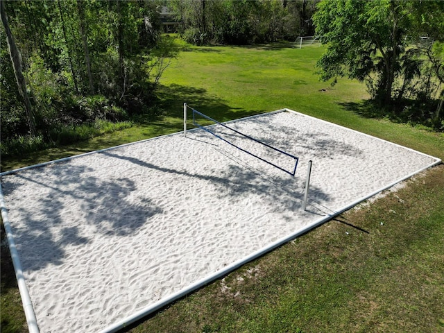 view of home's community featuring volleyball court