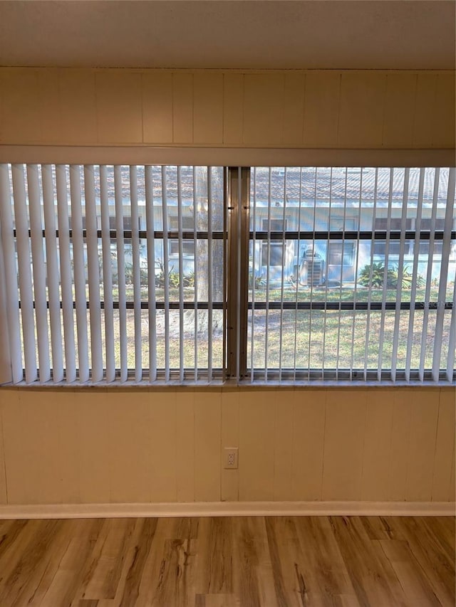11200 102nd Ave Unit 125, Seminole, FL 33778 - interior space featuring wood finished floors and baseboards