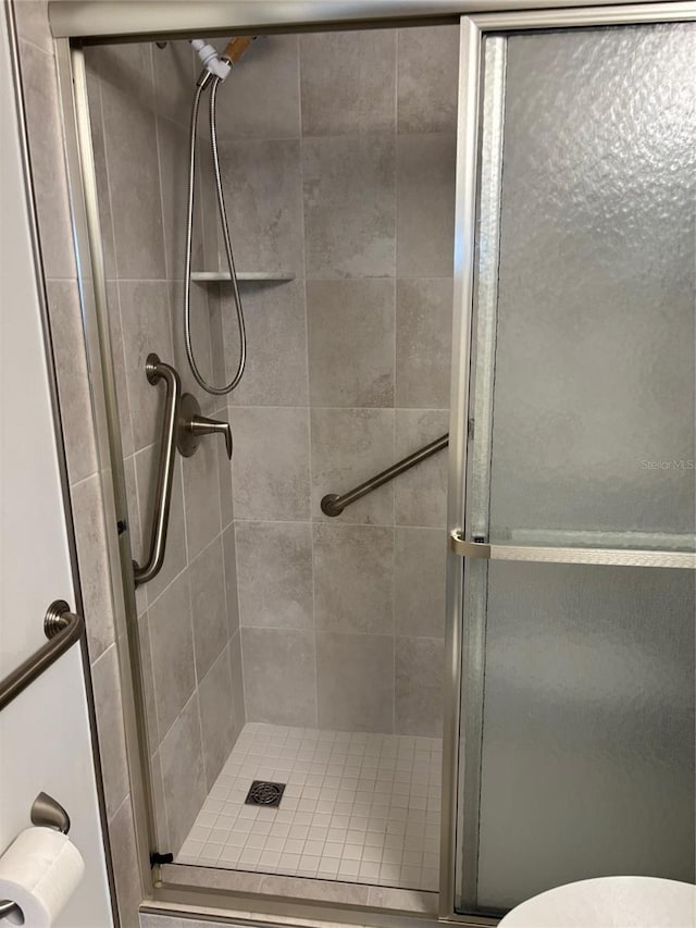 11200 102nd Ave Unit 125, Seminole, FL 33778 - full bathroom with a stall shower and toilet