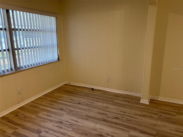 11200 102nd Ave Unit 125, Seminole, FL 33778 - spare room with baseboards and wood finished floors