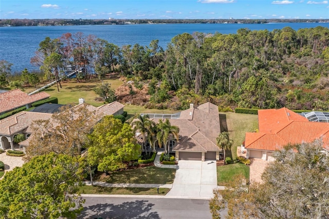 drone / aerial view featuring a water view