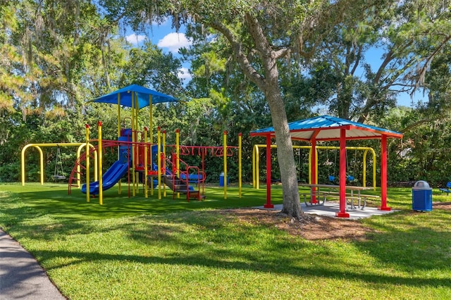 view of playground featuring a lawn