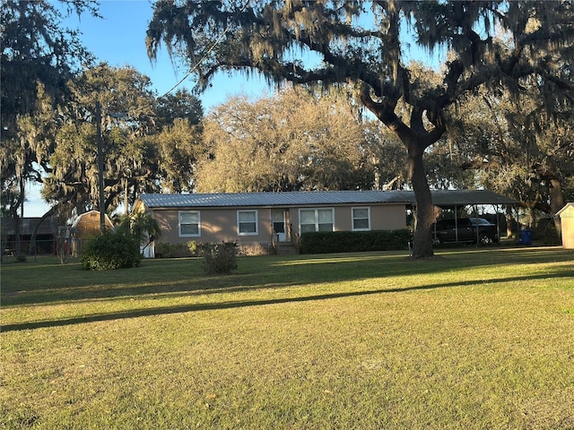 ranch-style house with a front lawn