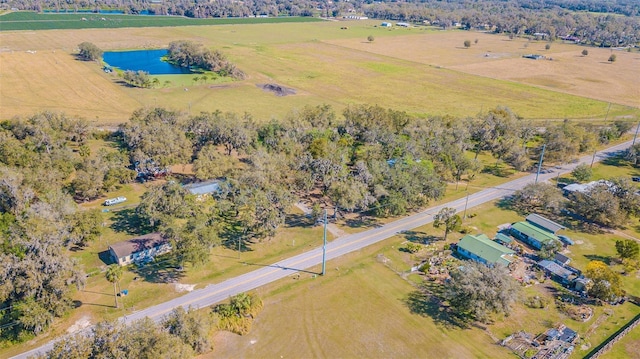 aerial view featuring a water view and a rural view