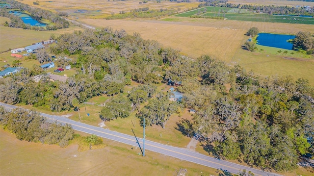 aerial view featuring a rural view and a water view