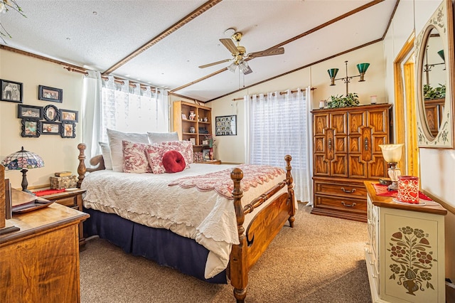 carpeted bedroom featuring lofted ceiling, ceiling fan, multiple windows, and a textured ceiling