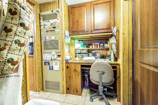 office area with light tile patterned flooring