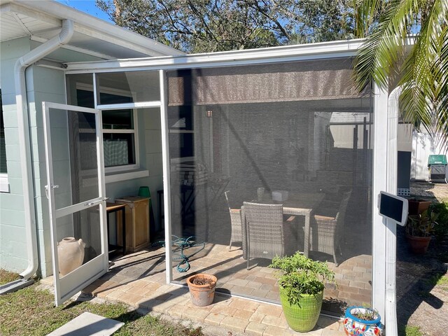 doorway to property with a patio