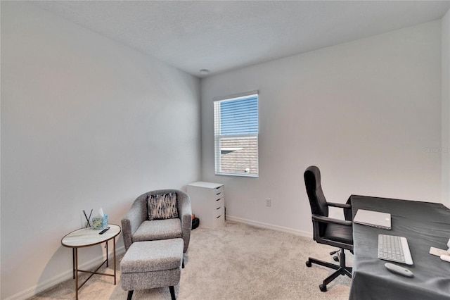 office area featuring carpet flooring and baseboards