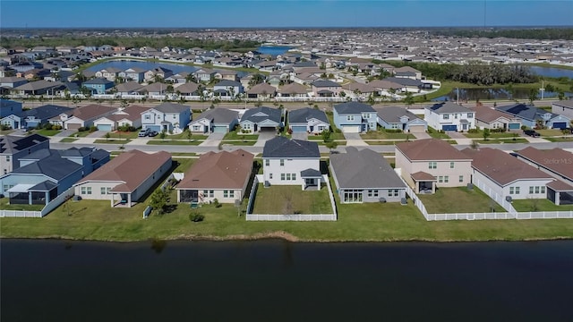 aerial view with a residential view and a water view