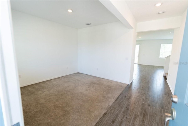11827 Cara Field Ave, Riverview, FL 33579 - unfurnished room with dark wood finished floors, recessed lighting, and baseboards