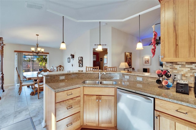 kitchen featuring sink, stainless steel dishwasher, and light brown cabinets