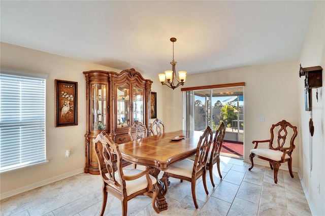 dining area with a chandelier