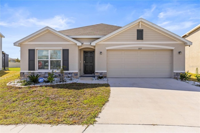 view of front of home with an attached garage, stone siding, driveway, stucco siding, and a front yard