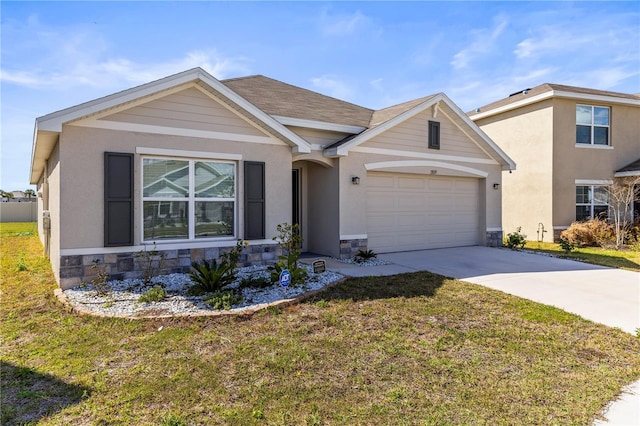 view of front of home with a garage, stone siding, a front lawn, and driveway