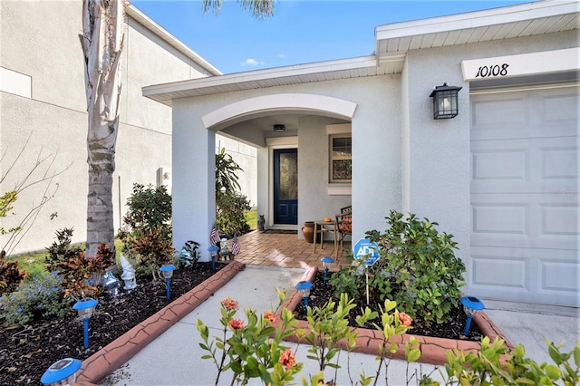 property entrance with a garage