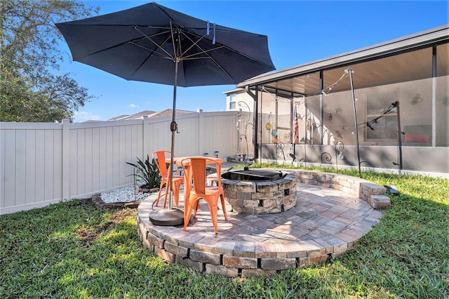 view of patio / terrace with a fire pit