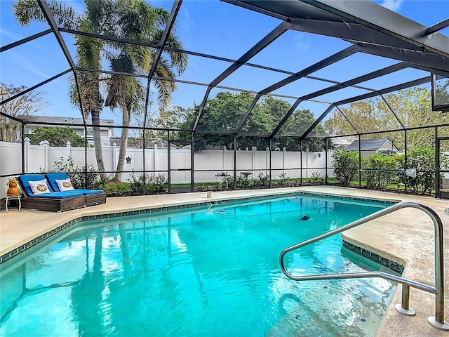 view of pool featuring an outdoor living space, a patio, and glass enclosure