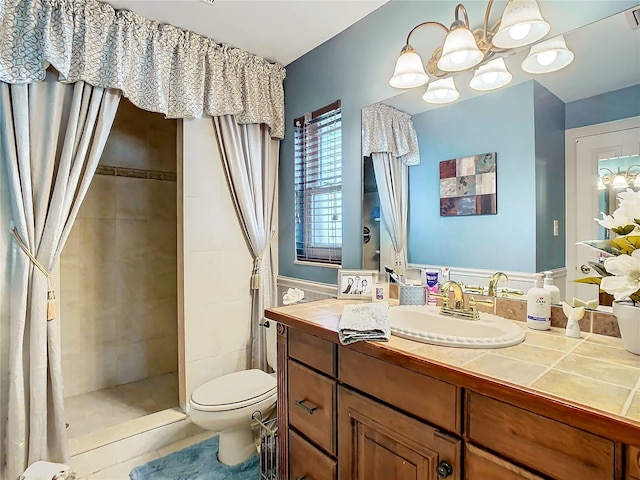 bathroom with vanity, toilet, tile patterned flooring, and a shower with shower curtain