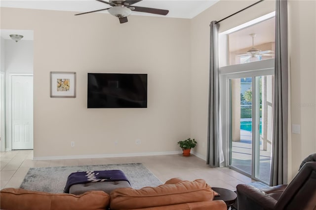 living room with light tile patterned floors and ceiling fan