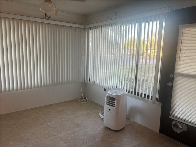 spare room with light tile patterned floors