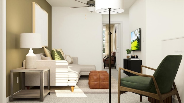 sitting room with light colored carpet and ceiling fan