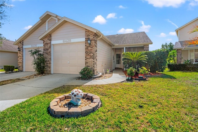 view of front facade featuring a garage and a front yard