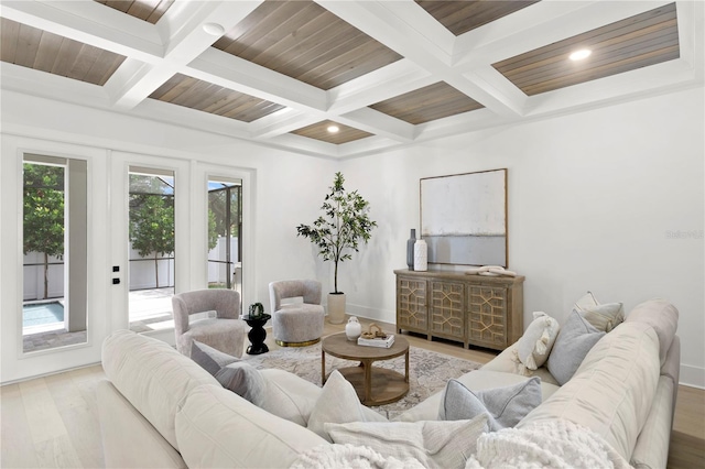 living room featuring coffered ceiling, beam ceiling, and light hardwood / wood-style flooring