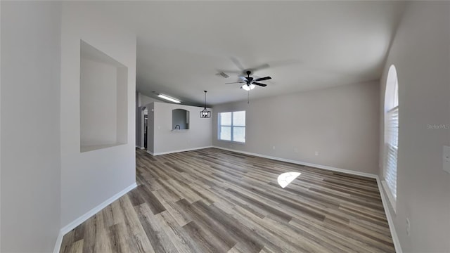 unfurnished room with light hardwood / wood-style floors and ceiling fan