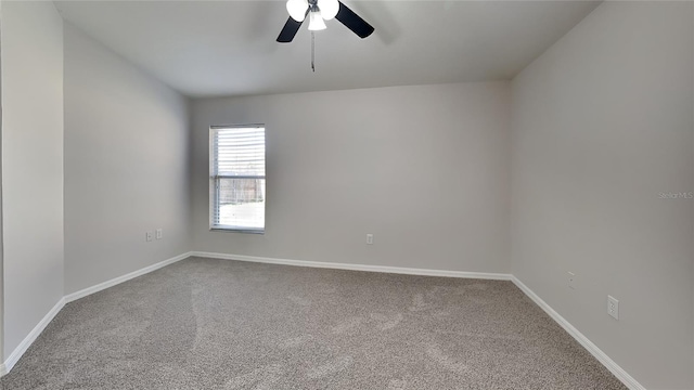 carpeted empty room with ceiling fan