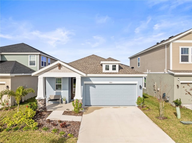 view of front facade featuring a garage and a front yard