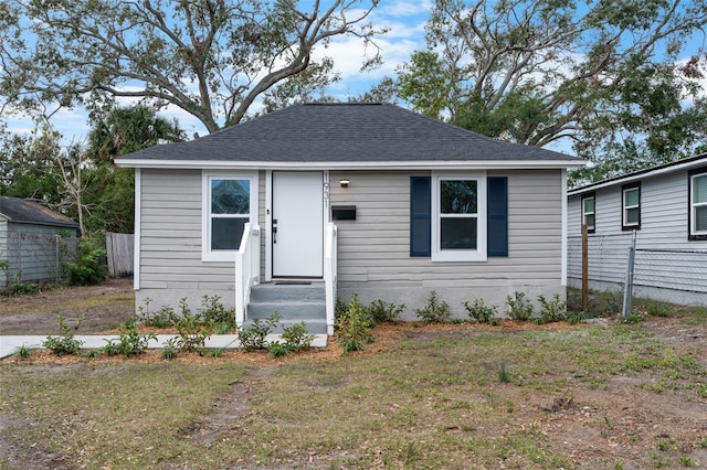 bungalow with a front yard