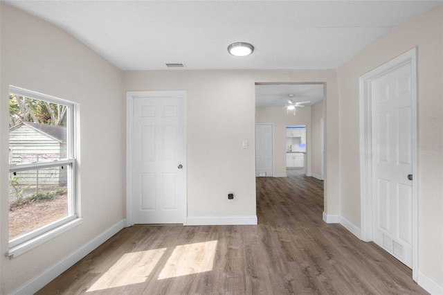 spare room featuring hardwood / wood-style floors