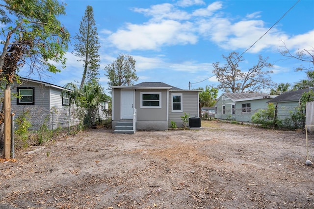 back of property with cooling unit