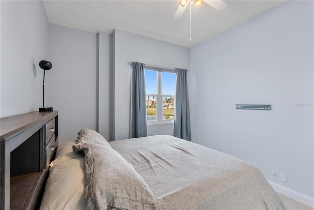 bedroom featuring ceiling fan