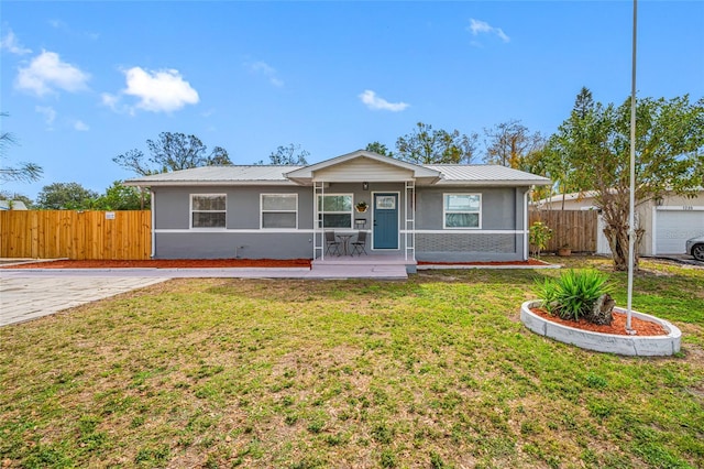 single story home with a front yard