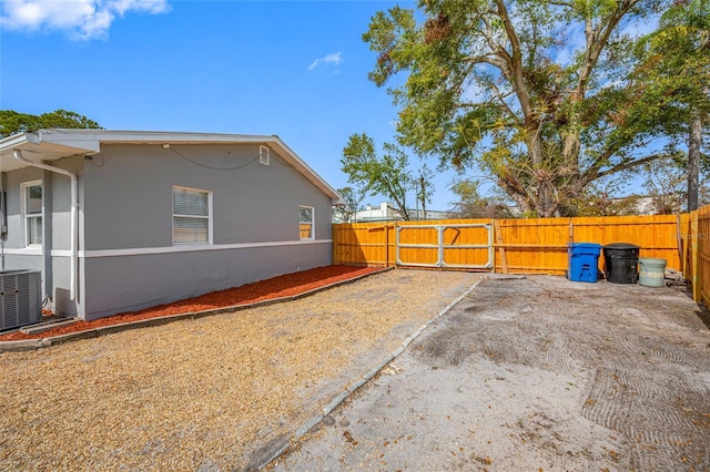 view of property exterior with cooling unit