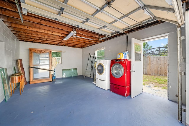 garage featuring washer and clothes dryer