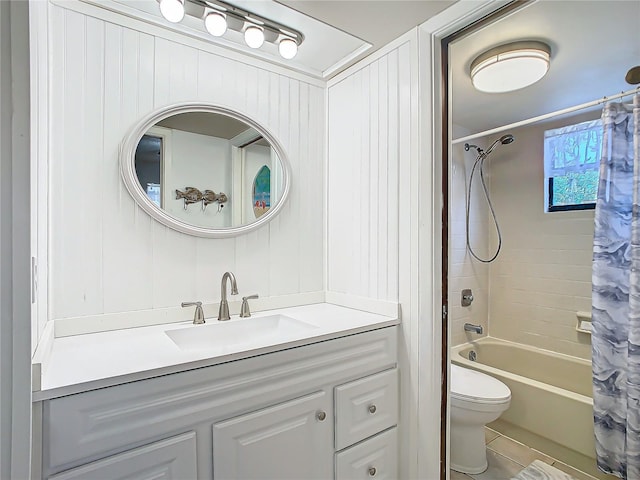 full bathroom featuring vanity, toilet, and shower / bath combo with shower curtain