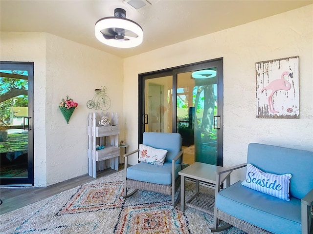 interior space featuring ceiling fan