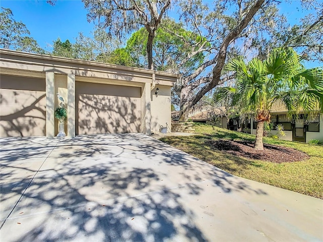 view of property exterior featuring a garage